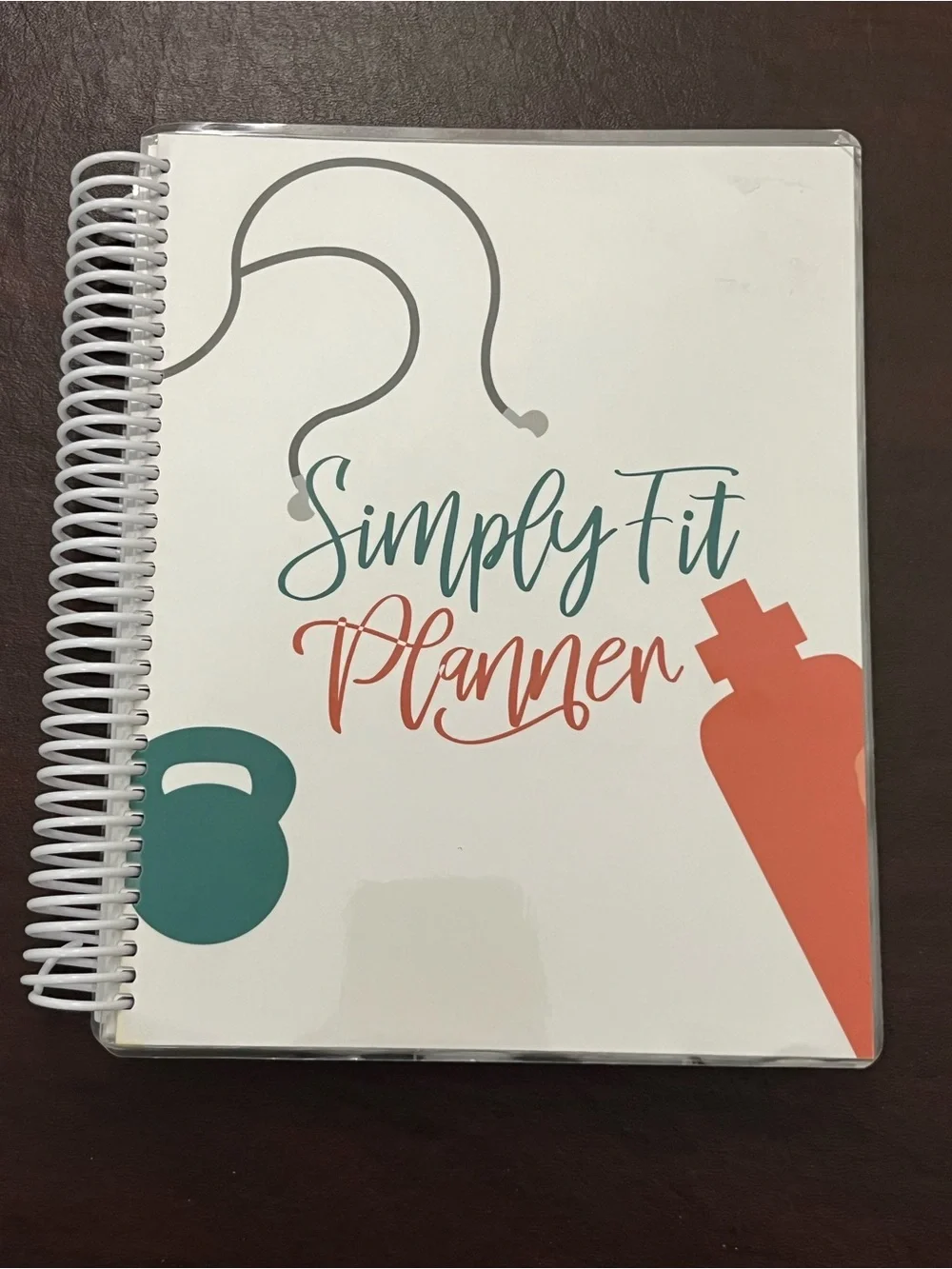 Simply Fit Planner. Track meals, water intake, goals, grocery list.